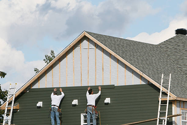 Professional Siding Replacement technician working in Essex, IL